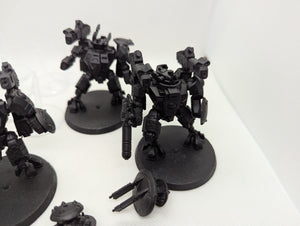 P/O: T'au Crisis Suits